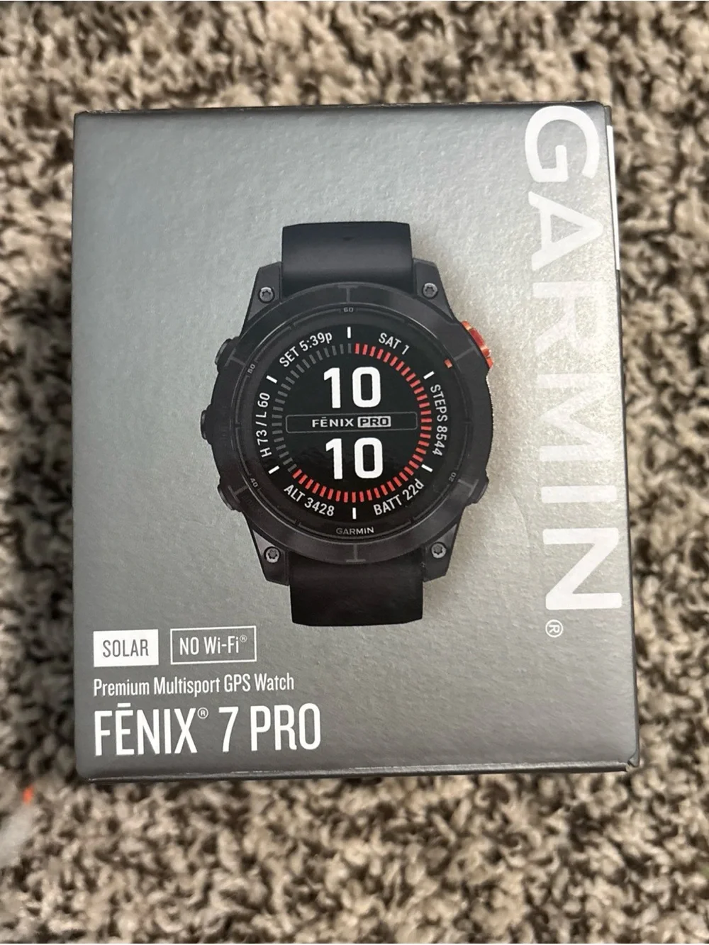garmin fēnix 7 Pro Solar Edition — slate gray and black with orange accent